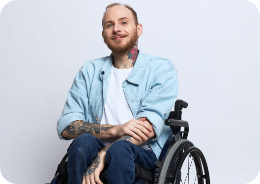 man smiling in wheelchair