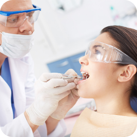 dental operation with visor glasses